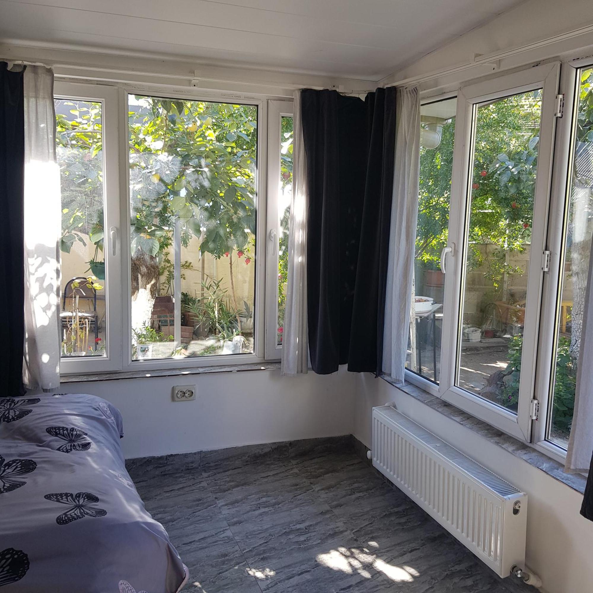 Hotel Домик У Куры à Tbilissi Extérieur photo