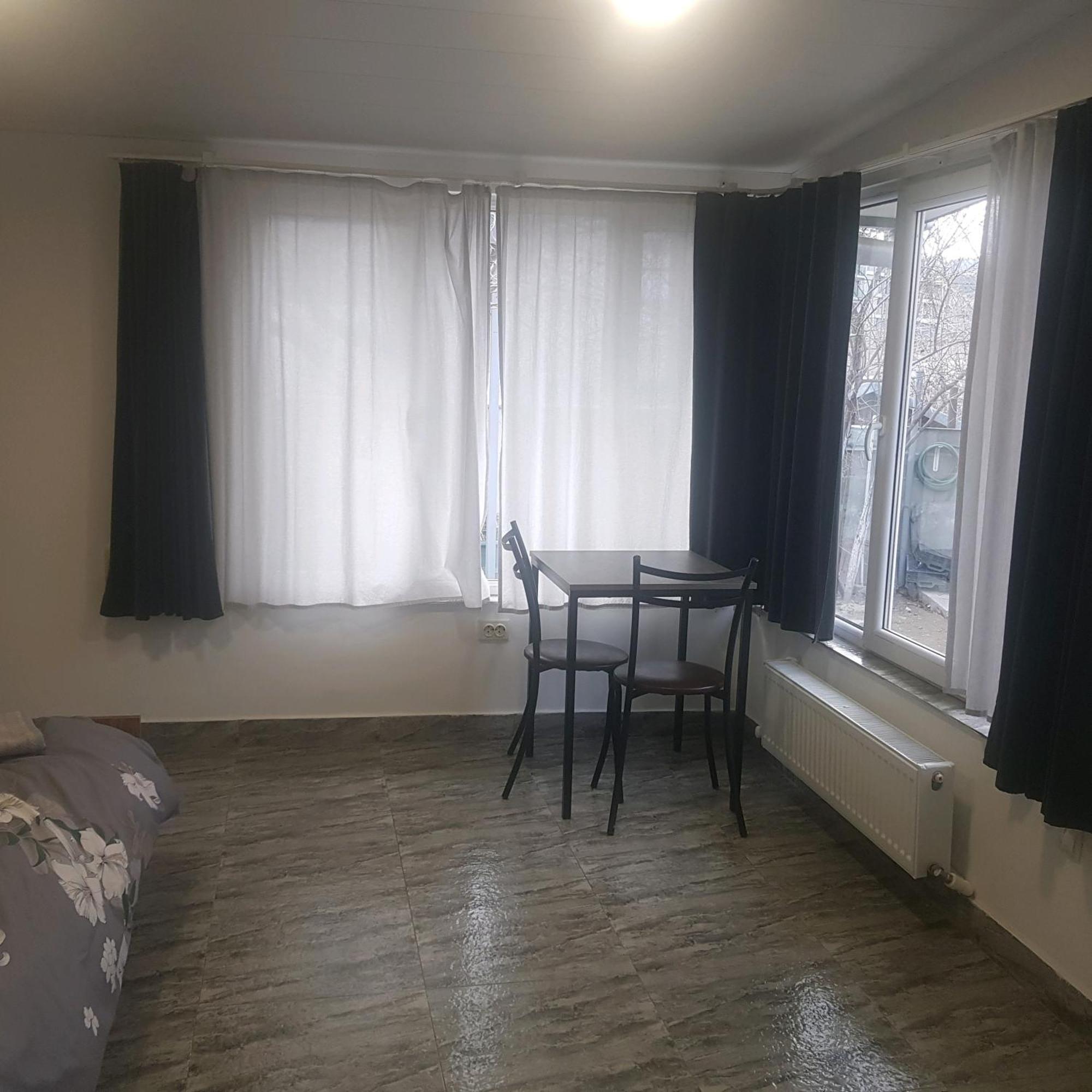 Hotel Домик У Куры à Tbilissi Extérieur photo