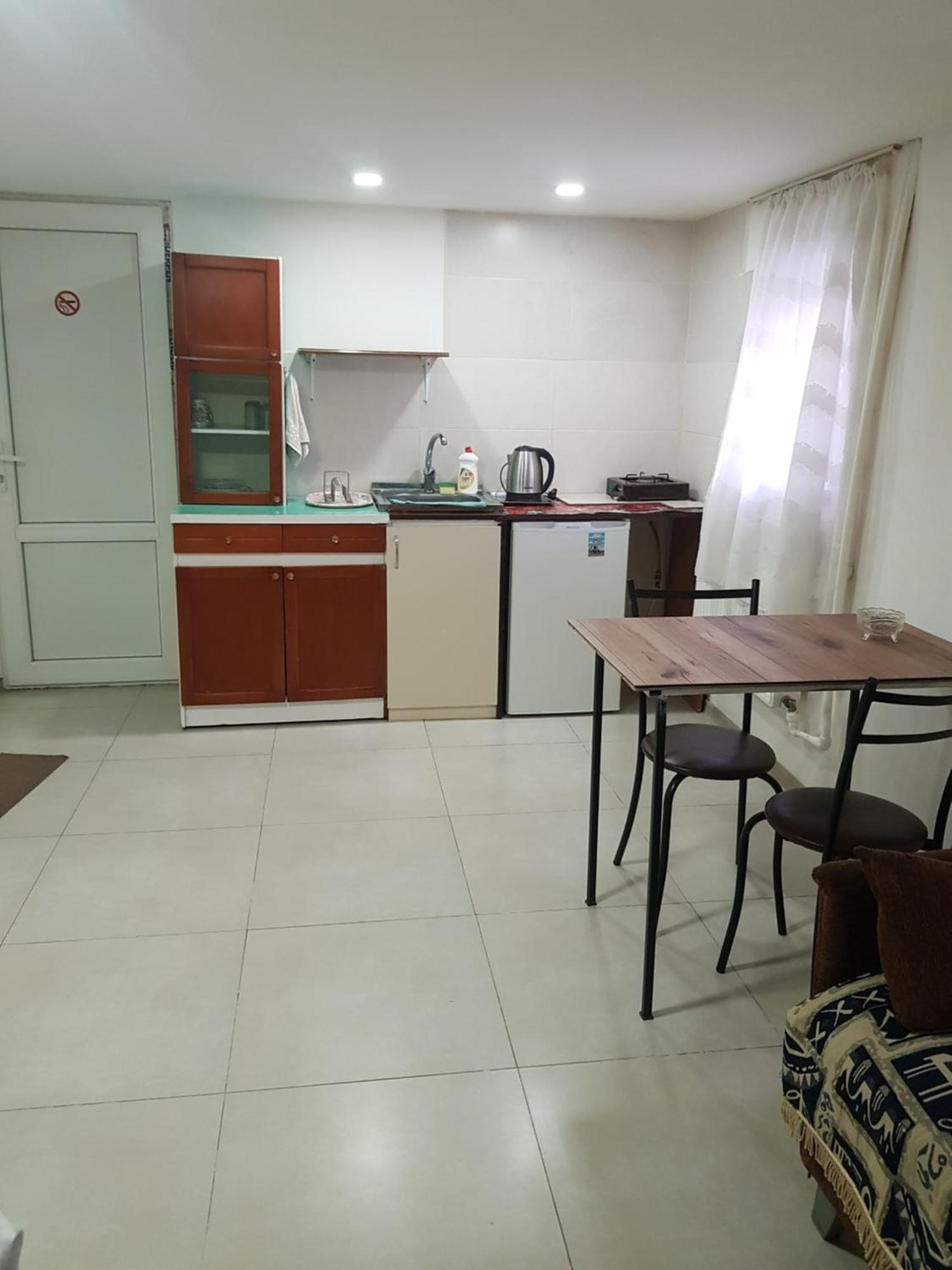 Hotel Домик У Куры à Tbilissi Extérieur photo